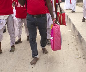Dauat Hussein Akran (35) from Kelapur town of Kelapur block in Yavatmal district walked 9 kms barefoot.