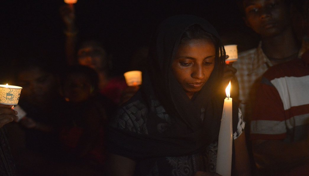 Woman participating in candle march
