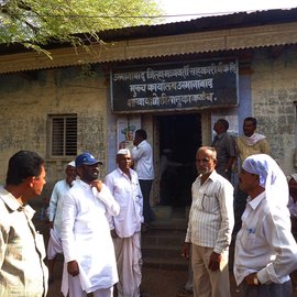 farmers outside the bank